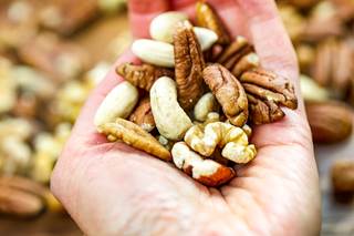 The researchers found that after adjustment for cardiovascular risk factors, total nut consumption was inversely associated with total cardiovascular disease and CHD. The researchers found that after adjustment for cardiovascular risk factors, total nut consumption was inversely associated with total cardiovascular disease and CHD.